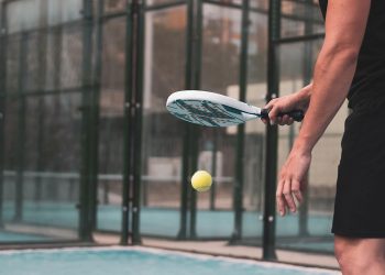 padel player playing a match in the open; Shutterstock ID 1991435840; purchase_order: Virgin.com content; job: ; client: VML content team; other: