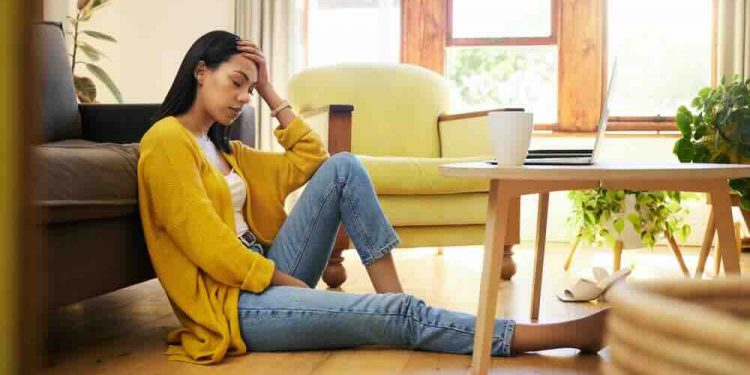 Stress, depression or burnout woman with laptop on living room floor for home finance, studying or house rent debt. Sad, anxiety and burnout student with mental health problem for online fail mistake