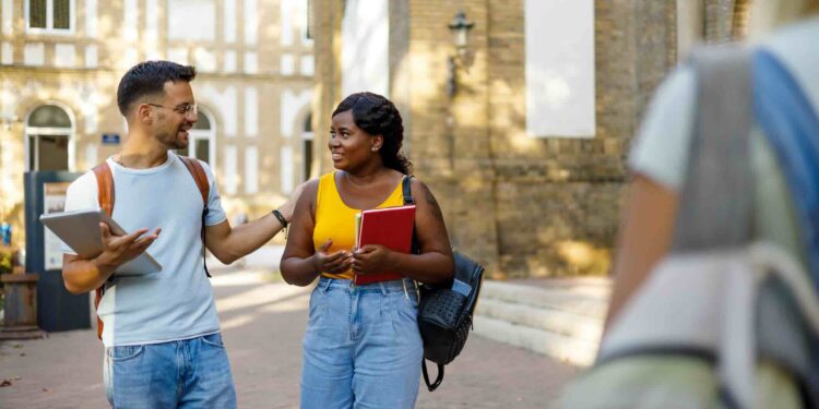 University friends create lasting memories as they laugh and chat together during their break