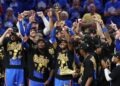 OKLAHOMA CITY, OKLAHOMA - JUNE 22:  Shai Gilgeous-Alexander #2 of the Oklahoma City Thunder celebrates with the Bill Russell NBA Finals Most Valuable Player trophy after defeating the Indiana Pacers 103-91 in Game Seven of the 2025 NBA Finals at Paycom Center on June 22, 2025 in Oklahoma City, Oklahoma. NOTE TO USER: User expressly acknowledges and agrees that, by downloading and or using this photograph, User is consenting to the terms and conditions of the Getty Images License Agreement. (Photo by Justin Ford/Getty Images)