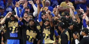 OKLAHOMA CITY, OKLAHOMA - JUNE 22:  Shai Gilgeous-Alexander #2 of the Oklahoma City Thunder celebrates with the Bill Russell NBA Finals Most Valuable Player trophy after defeating the Indiana Pacers 103-91 in Game Seven of the 2025 NBA Finals at Paycom Center on June 22, 2025 in Oklahoma City, Oklahoma. NOTE TO USER: User expressly acknowledges and agrees that, by downloading and or using this photograph, User is consenting to the terms and conditions of the Getty Images License Agreement. (Photo by Justin Ford/Getty Images)
