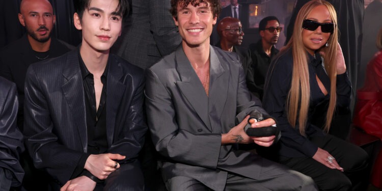 NEW YORK, NEW YORK - MAY 16: (L-R) Zhang Ling He, Shawn Mendes and Mariah Carey attend the GucciCore Fashion Show on May 16, 2026 in New York City. (Photo by Kevin Mazur/Getty Images for Gucci)
