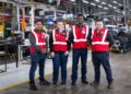 (from left to right) Jason Hughes, Senior Manager: Manufacturing Engineering at Isuzu Motors South Africa; Anri Els and Humprey Moyo, third-year Mechatronics students at Nelson Mandela University; and Riaan Brown, Entity Leader: Chair of Mechatronics, during a student visit to IMSAf’s manufacturing plant in Gqeberha.