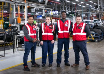 (from left to right) Jason Hughes, Senior Manager: Manufacturing Engineering at Isuzu Motors South Africa; Anri Els and Humprey Moyo, third-year Mechatronics students at Nelson Mandela University; and Riaan Brown, Entity Leader: Chair of Mechatronics, during a student visit to IMSAf’s manufacturing plant in Gqeberha.