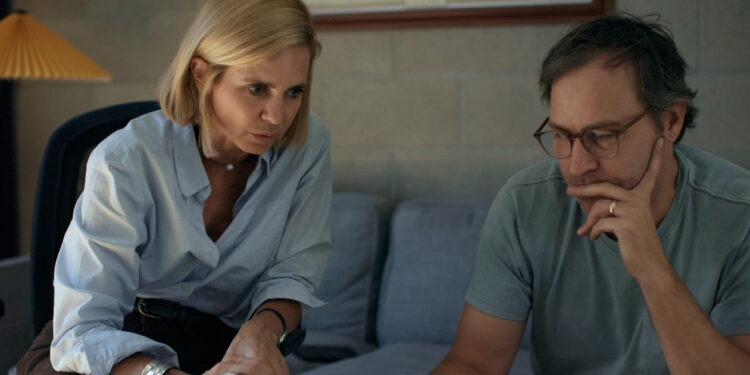 Mariana van Zeller and Jeff Plunkett speak with a National Geographic executive on the phone. (National Geographic)